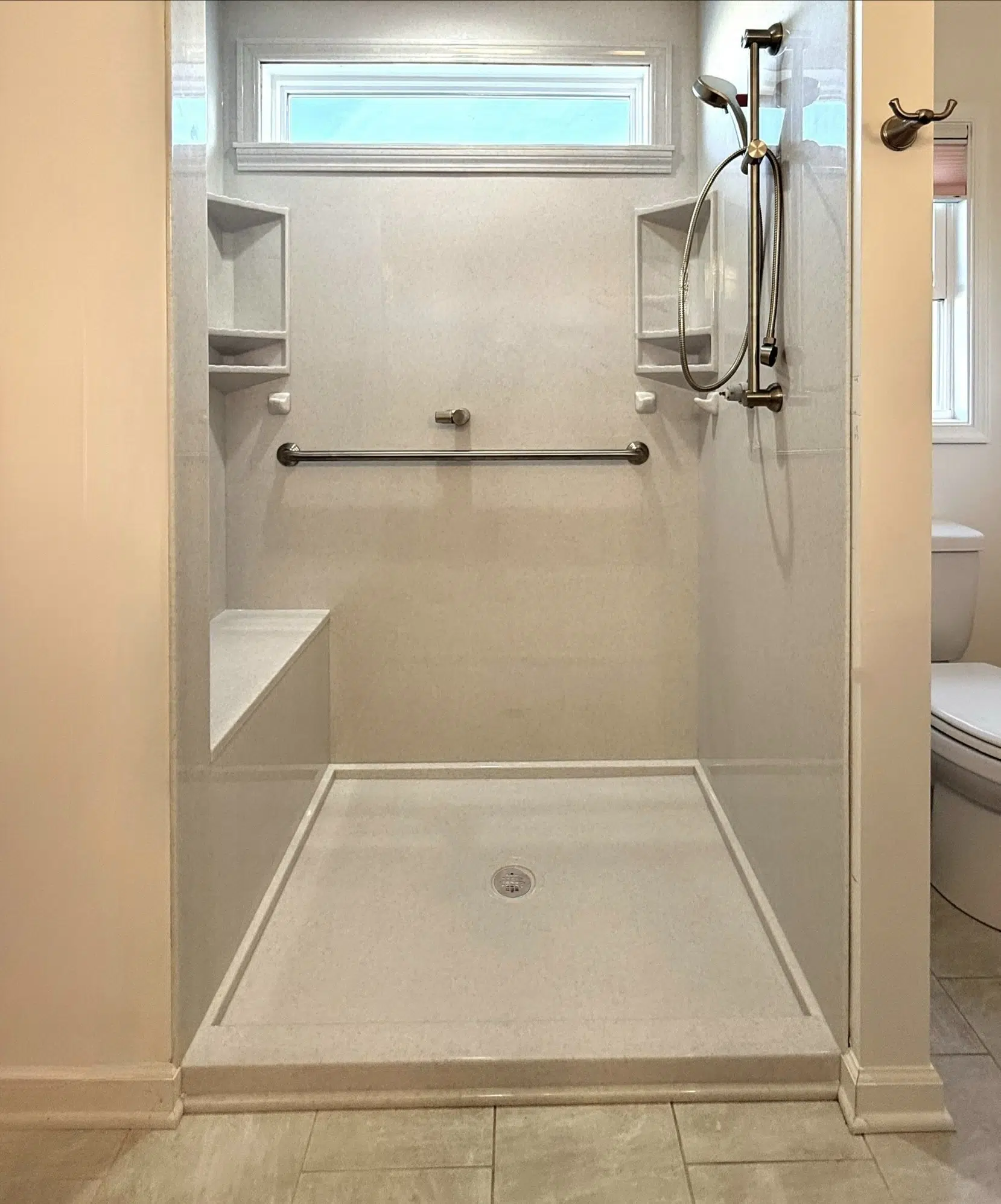 Custom Onyx shower — built-in bench