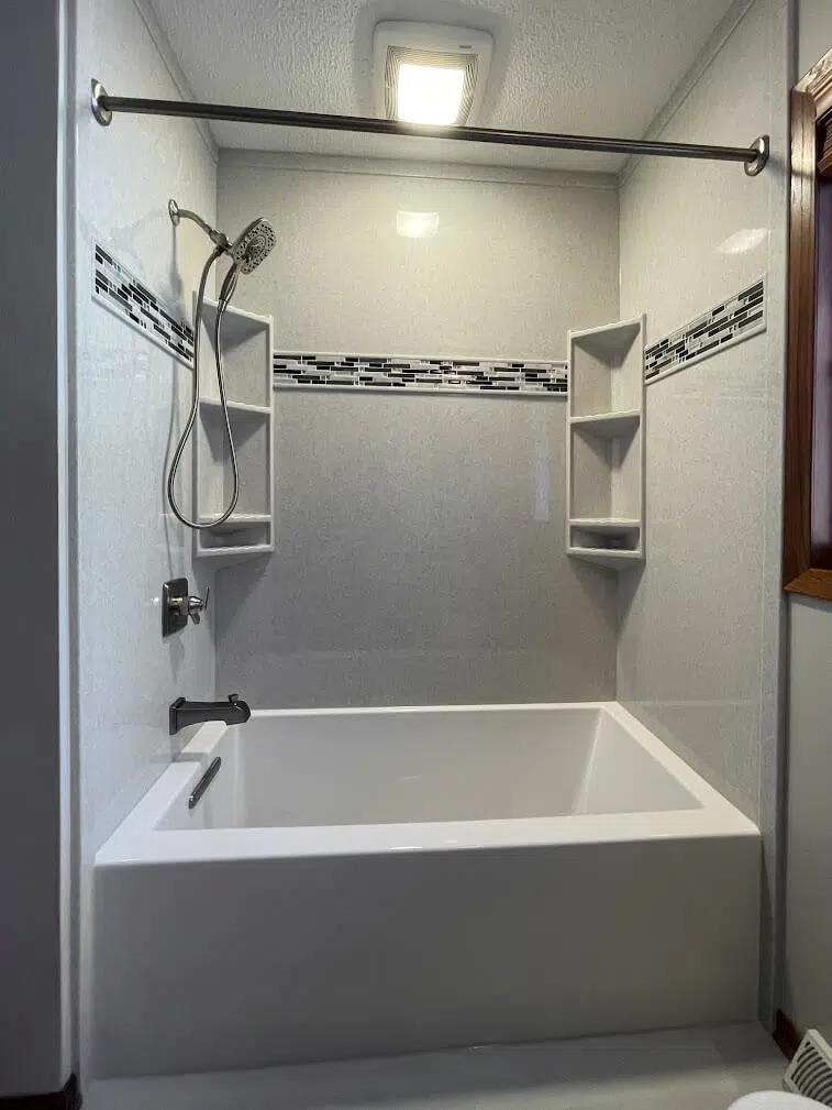 Bathroom tub surround conversion with durable Onyx panels