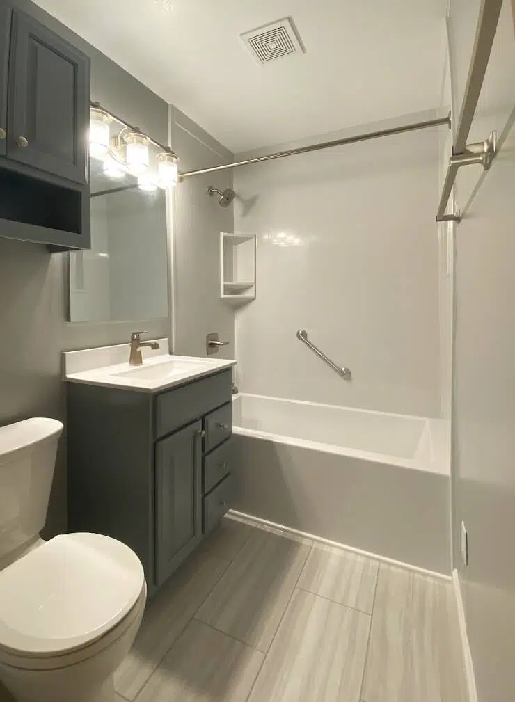 Finished tub and shower surround with custom-fit Onyx walls