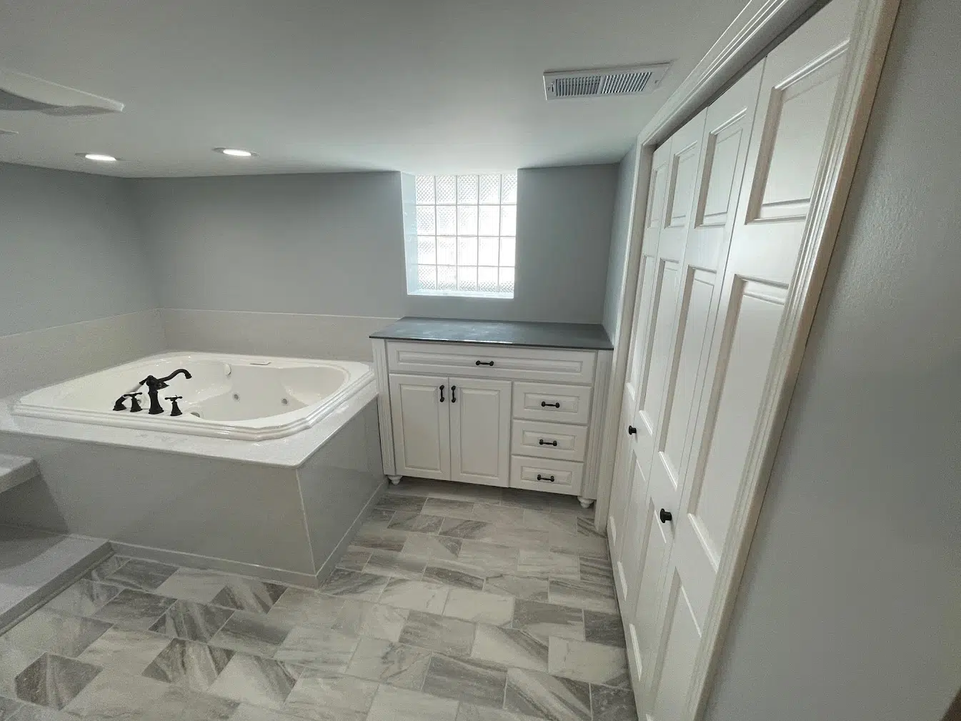 Modern tub and shower surround remodel for a Minnesota bathroom