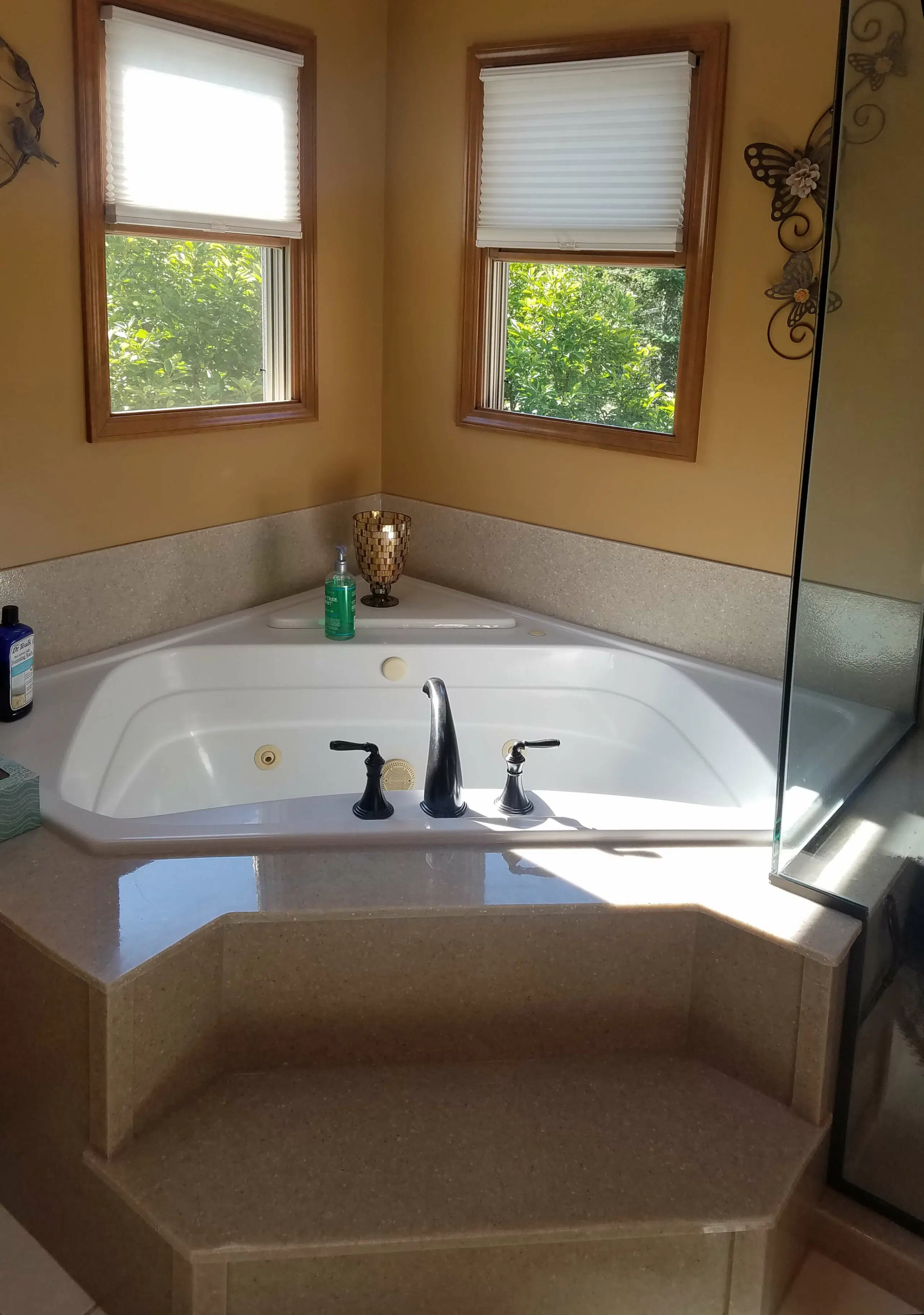 Custom tub surround with coordinated Onyx panel design