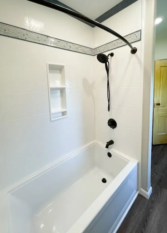 Custom bathroom surround with Onyx wall system and trim details